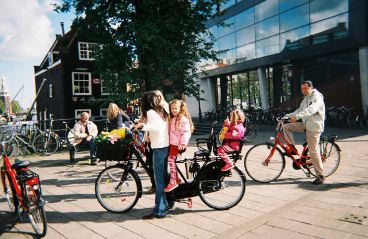 one bike, three passengers